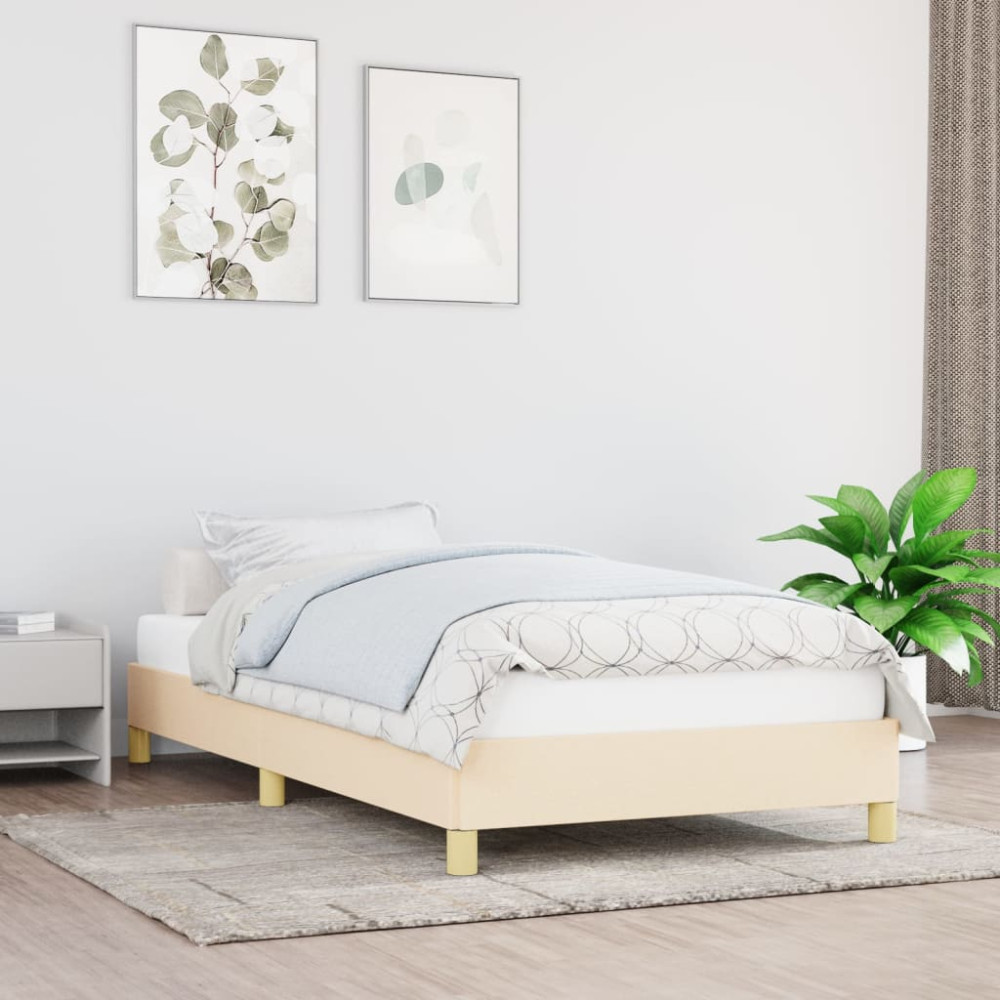 Produktbild för Sängram utan madrass gräddvit 90x190 cm tyg