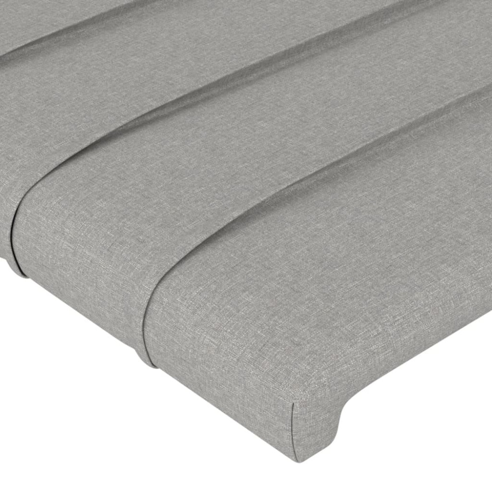 Produktbild för Sänggavel ljusgrå 180x5x118/128 cm tyg