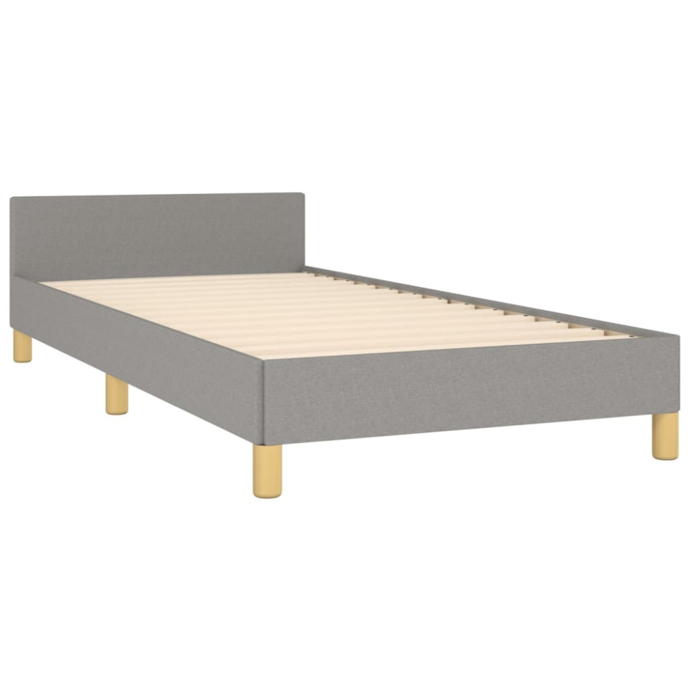 Produktbild för Sängram med huvudgavel ljusgrå 90x200 cm tyg
