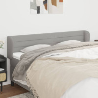Produktbild för Sänggavel med kanter ljusgrå 163x23x78/88 cm tyg