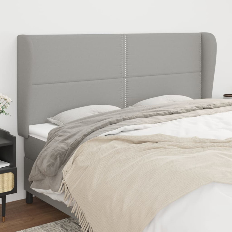 Produktbild för Sänggavel med kanter ljusgrå 163x23x118/128 cm tyg