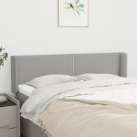 Produktbild för Sänggavel med kanter ljusgrå 147x16x78/88 cm tyg