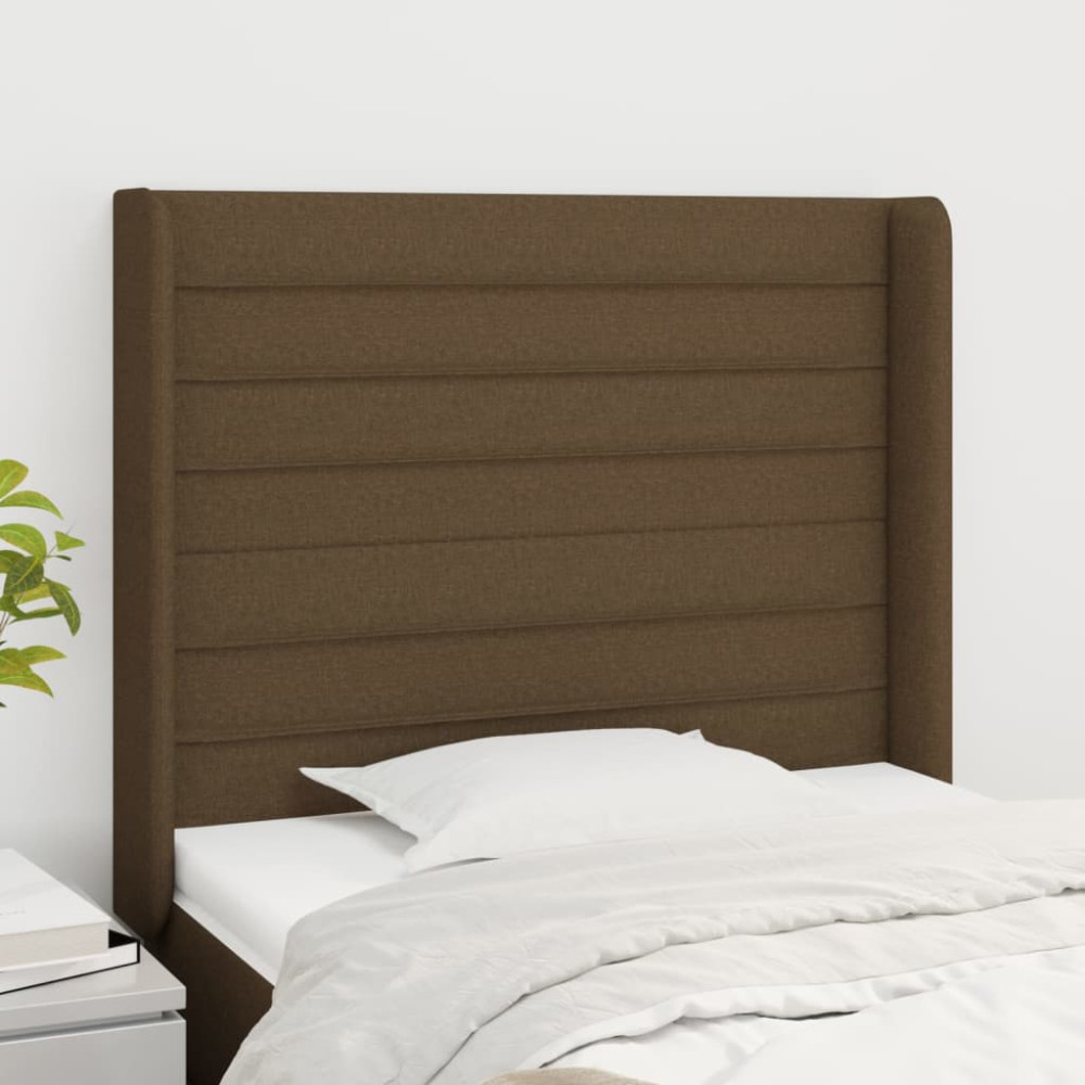Produktbild för Sänggavel med kanter mörkbrun 83x16x118/128 cm tyg