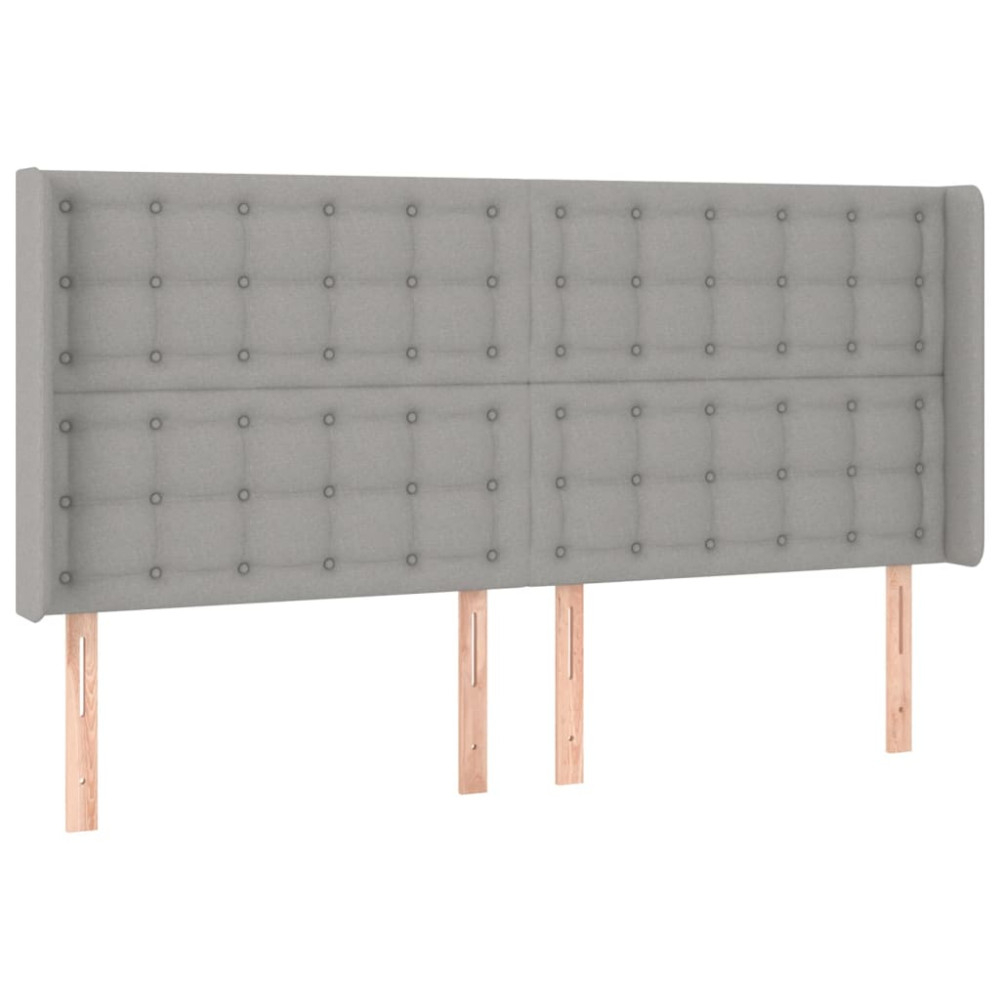 Produktbild för Sänggavel med kanter ljusgrå 183x16x118/128 cm tyg