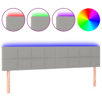 Produktbild för Sänggavel LED ljusgrå 200x5x78/88 cm tyg