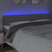 Produktbild för Sänggavel LED ljusgrå 160x5x78/88 cm tyg