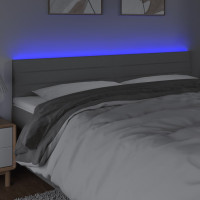 Produktbild för Sänggavel LED ljusgrå 200x5x78/88 cm tyg