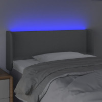 Produktbild för Sänggavel LED ljusgrå 83x16x78/88 cm tyg