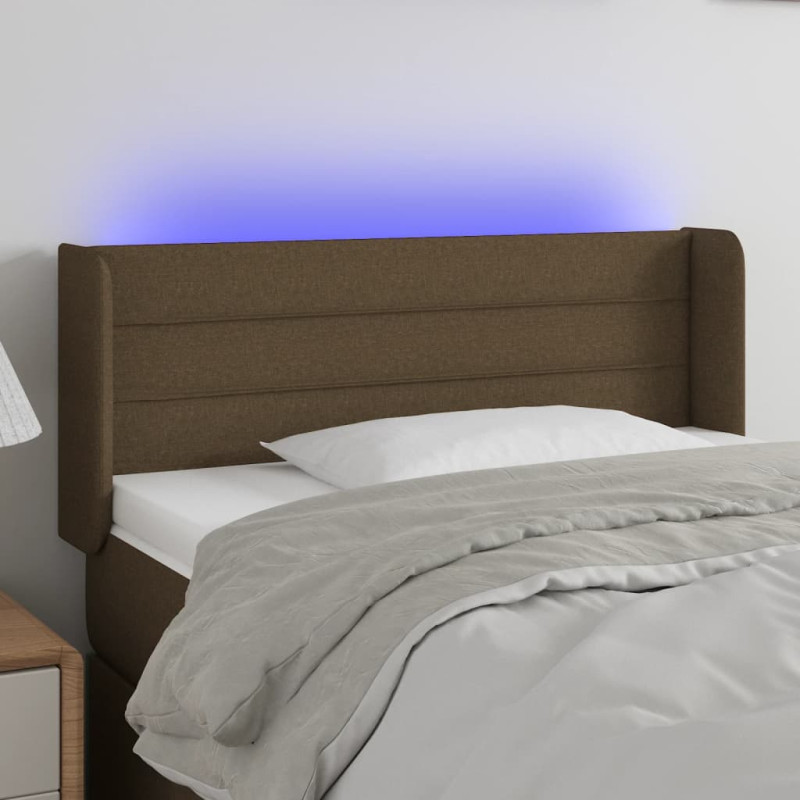 Produktbild för Sänggavel LED mörkbrun 83x16x78/88 cm tyg