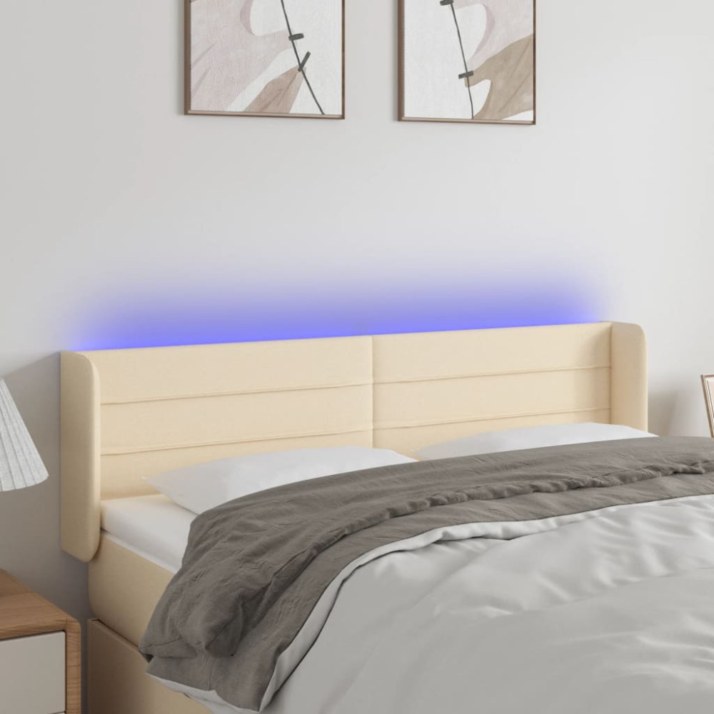 Produktbild för Sänggavel LED gräddvit 147x16x78/88 cm tyg