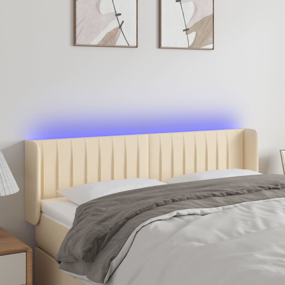 Produktbild för Sänggavel LED gräddvit 147x16x78/88 cm tyg