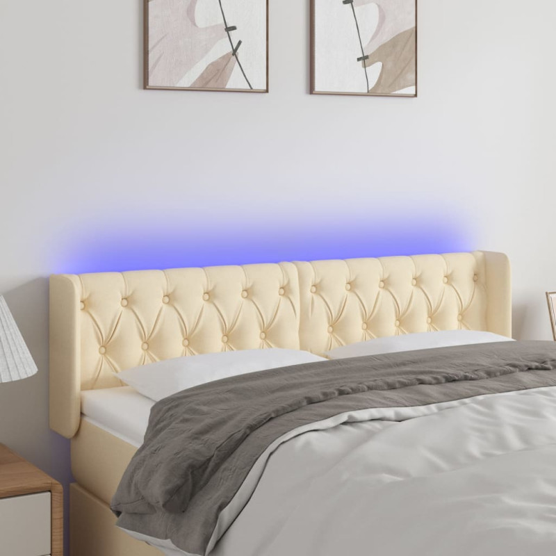Produktbild för Sänggavel LED gräddvit 147x16x78/88 cm tyg