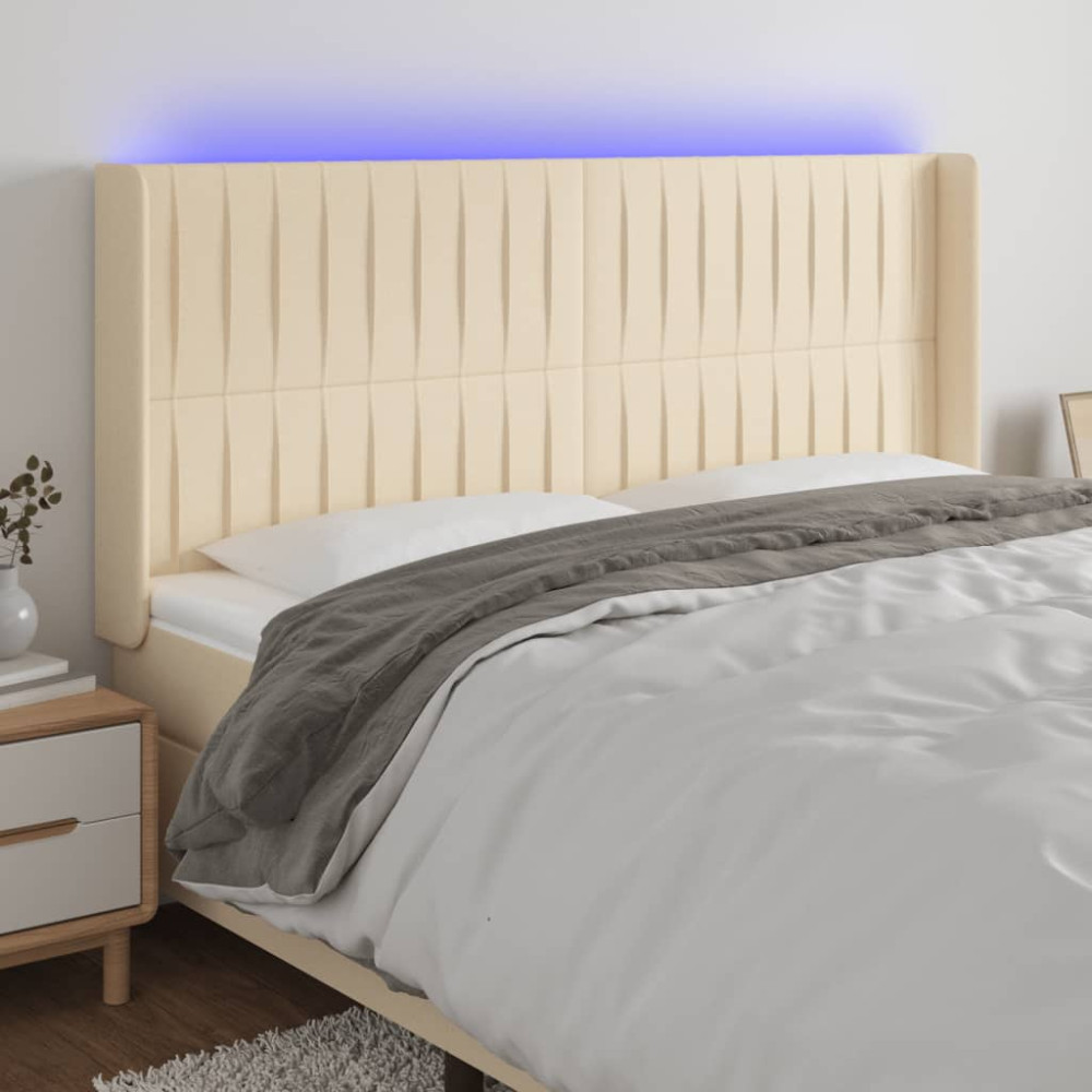 Produktbild för Sänggavel LED gräddvit 163x16x118/128 cm tyg