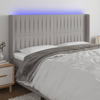 Produktbild för Sänggavel LED ljusgrå 163x16x118/128 cm tyg