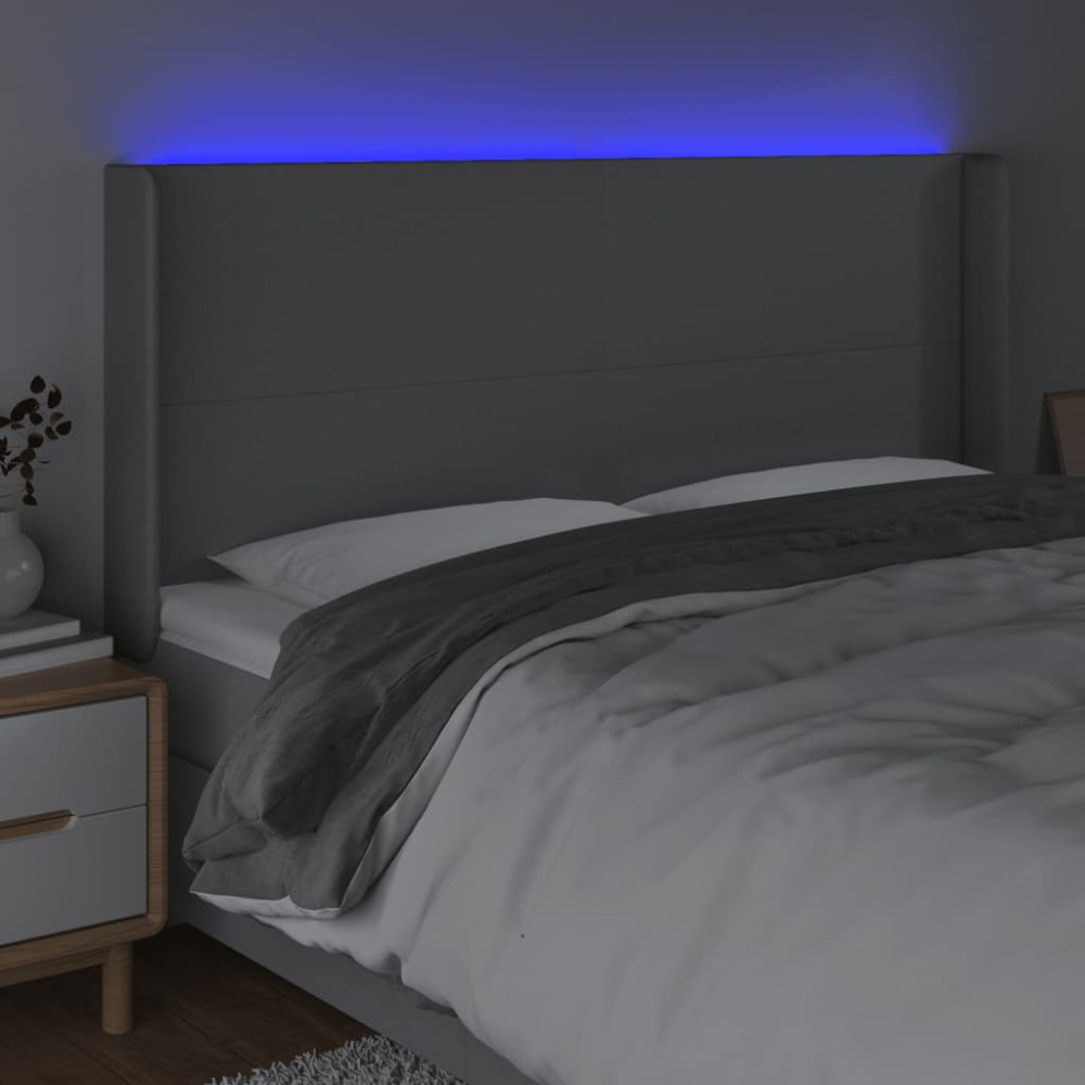 Produktbild för Sänggavel LED ljusgrå 163x16x118/128 cm tyg