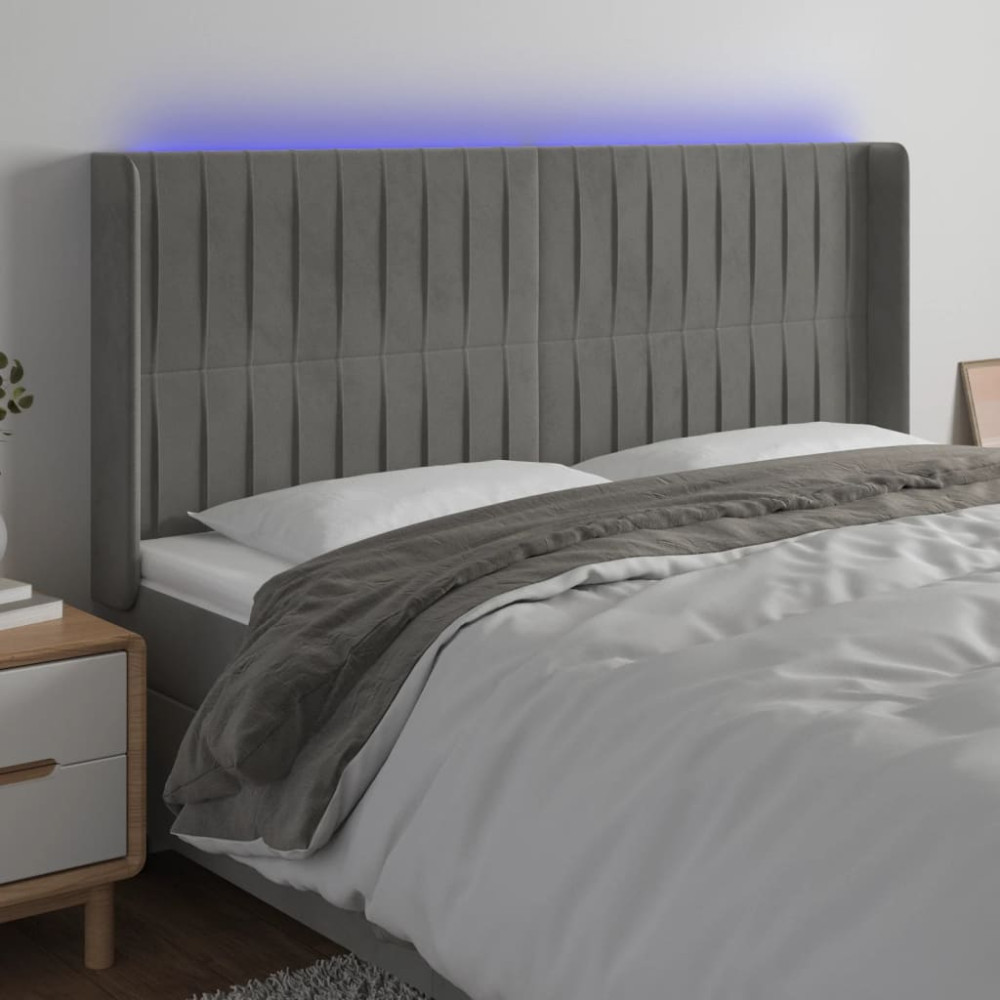 Produktbild för Sänggavel LED ljusgrå 163x16x118/128 cm sammet