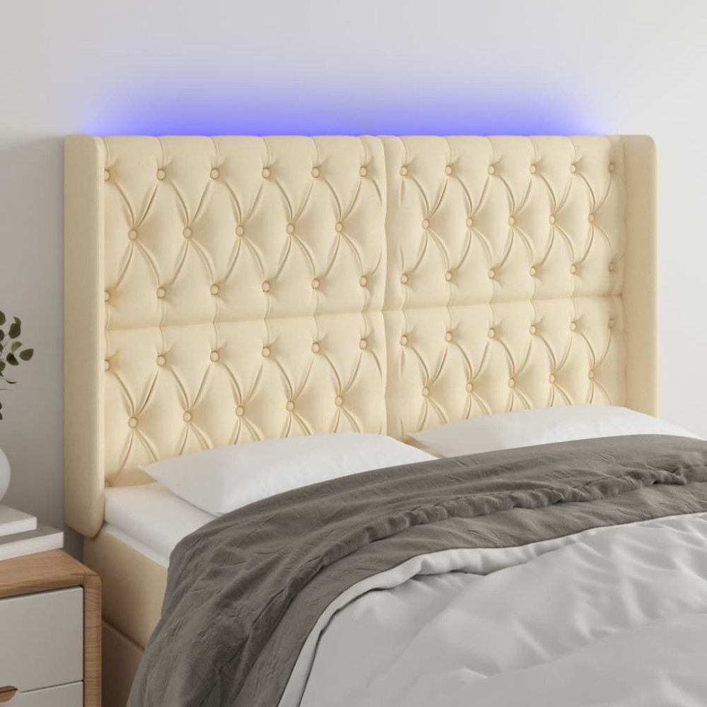 Produktbild för Sänggavel LED gräddvit 163x16x118/128 cm tyg