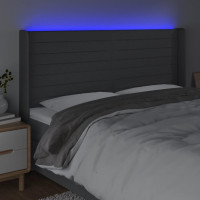 Produktbild för Sänggavel LED mörkgrå 163x16x118/128 cm tyg