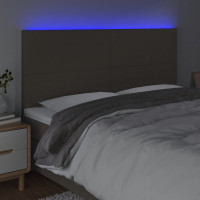 Produktbild för Sänggavel LED taupe 160x5x118/128 cm tyg