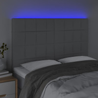 Produktbild för Sänggavel LED ljusgrå 144x5x118/128 cm tyg