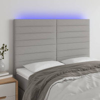 Produktbild för Sänggavel LED ljusgrå 144x5x118/128 cm tyg