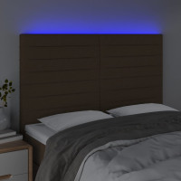 Produktbild för Sänggavel LED mörkbrun 144x5x118/128 cm tyg