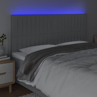 Produktbild för Sänggavel LED ljusgrå 160x5x118/128 cm tyg
