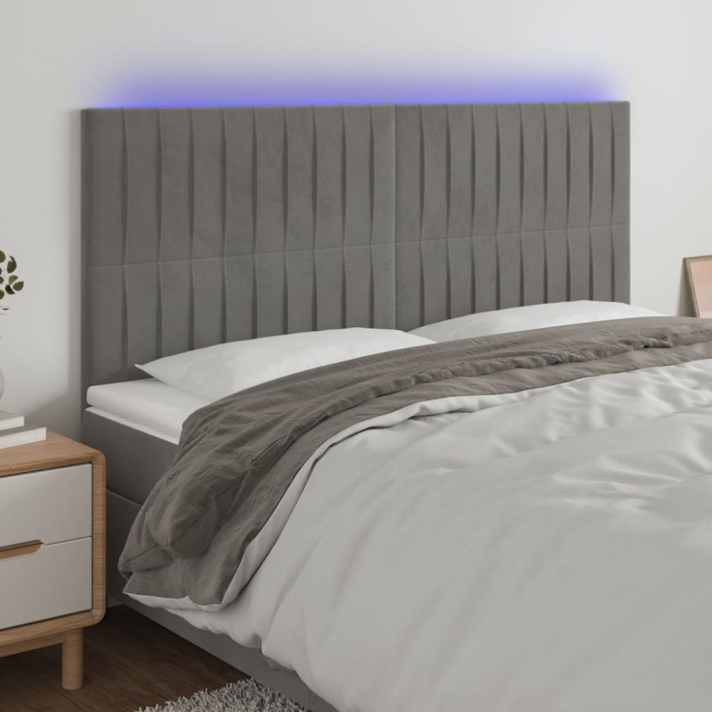 Produktbild för Sänggavel LED ljusgrå 180x5x118/128 cm sammet