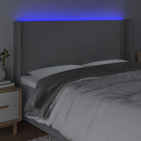 Produktbild för Sänggavel LED ljusgrå 203x16x118/128 cm tyg