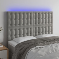 Produktbild för Sänggavel LED ljusgrå 144x5x118/128 cm sammet