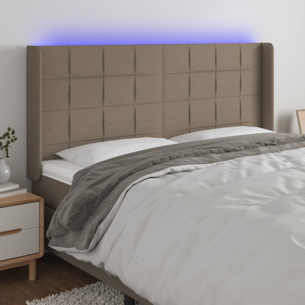 Produktbild för Sänggavel LED taupe 203x16x118/128 cm tyg