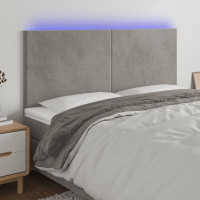 Produktbild för Sänggavel LED ljusgrå 160x5x118/128 cm sammet