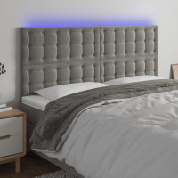 Produktbild för Sänggavel LED ljusgrå 160x5x118/128 cm sammet