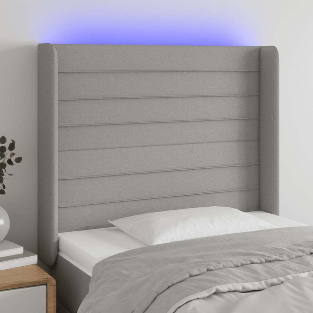 Produktbild för Sänggavel LED ljusgrå 93x16x118/128 cm tyg