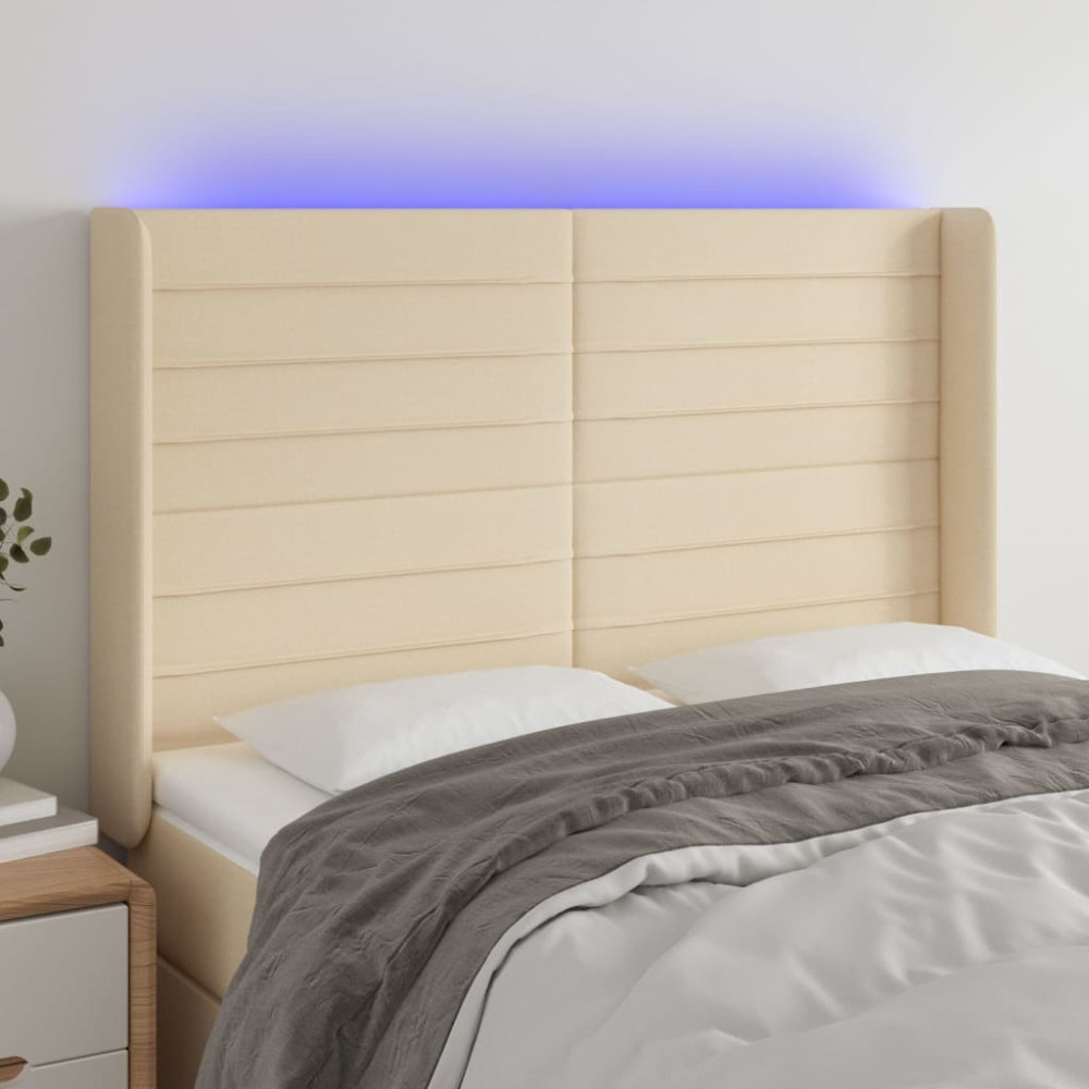 Produktbild för Sänggavel LED gräddvit 147x16x118/128 cm tyg