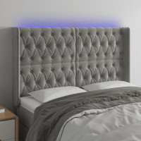 Produktbild för Sänggavel LED ljusgrå 147x16x118/128 cm sammet