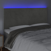 Produktbild för Sänggavel LED ljusgrå 180x5x118/128 cm sammet