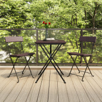 Produktbild för Hopfällbara caféstolar 2 st brun konstrotting och stål
