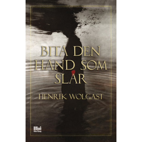 Henrik Wolgast Bita den hand som slår (bok, danskt band)