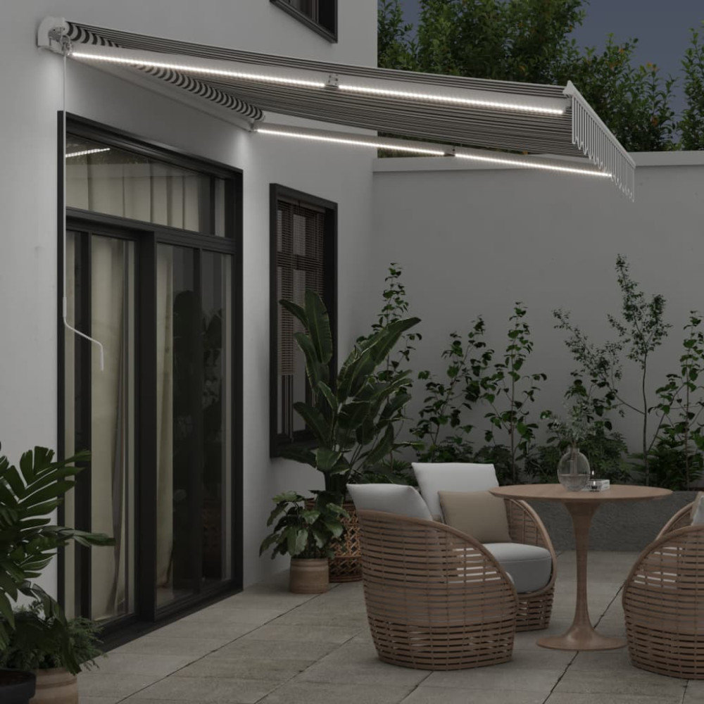 Produktbild för Markis manuellt infällbar med LEDs antracit och vit 350x250 cm