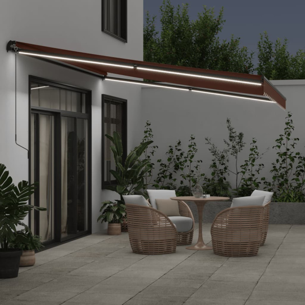 Produktbild för Markis manuellt infällbar med LEDs brun 450x350 cm