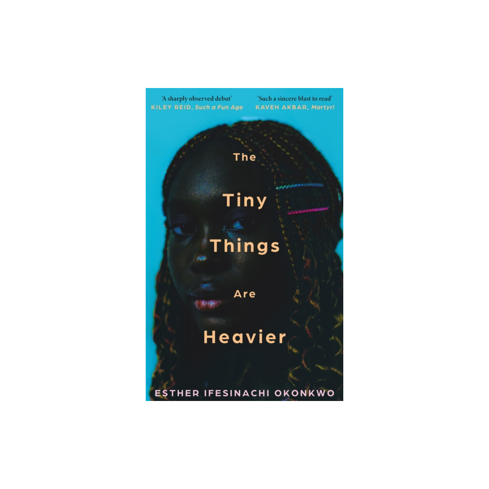 Produktbild för The Tiny Things Are Heavier (häftad, eng)