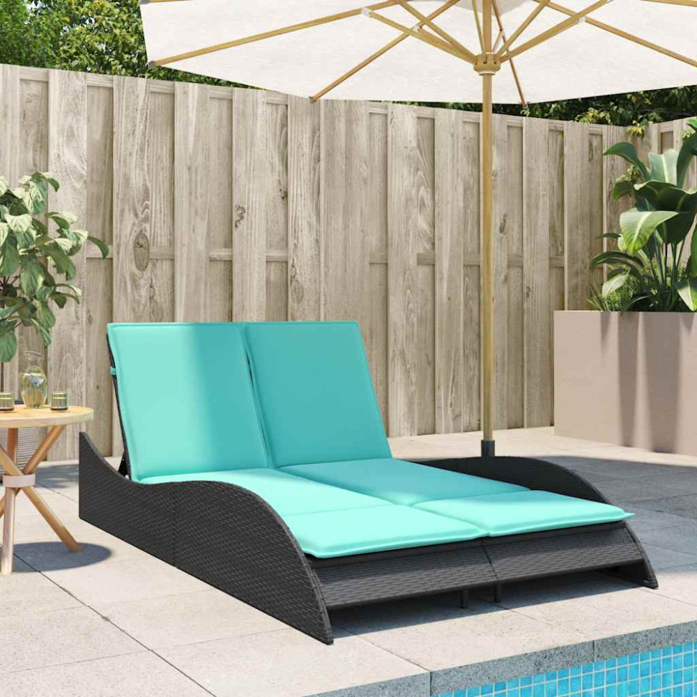 Produktbild för Solsäng med dynor svart 114x205x73 cm konstrotting