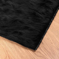 Produktbild för Fuskfäll matta TAFALLA Svart 100 x 200 cm Polyester