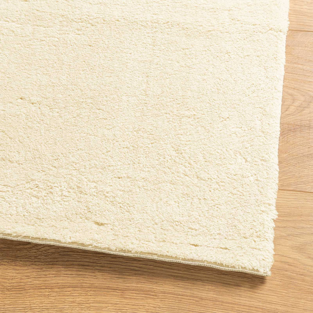 Produktbild för Mellanhög mjuk och tvättbar matta HUARTE Kräm 80 x 1000 cm