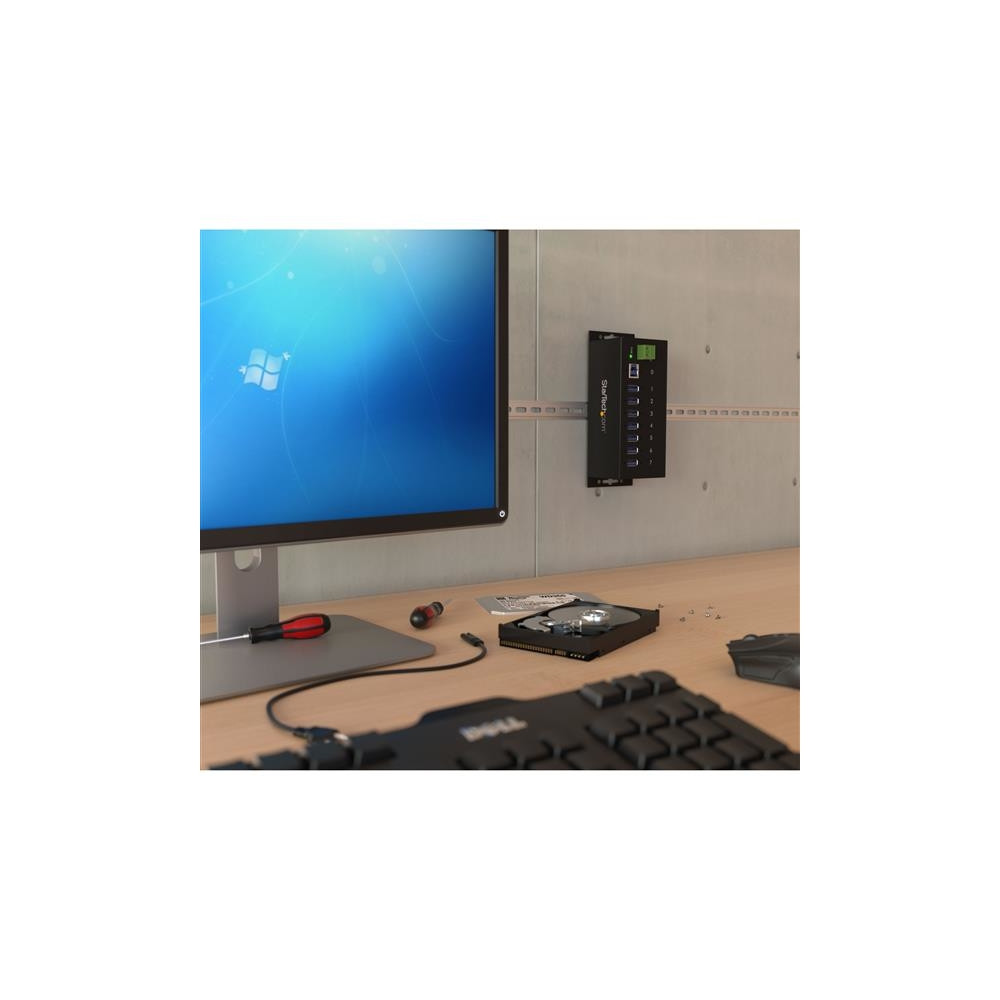 Produktbild för StarTech.com USB 3.0-hubb med 7 portar - Industriell USB-A-hubb i metall med ESD-skydd och 350 W överspänningsskydd - Monterbar på DIN-skena, vägg eller skrivbord - TAA-kompatibel USB-expansionshubb - hubb - 7 portar